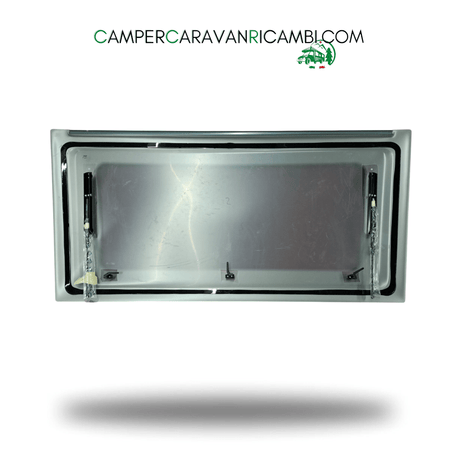 FINESTRA TRAPEZOIDALE IN PLEXIGLASS FRONTALE PER CARAVAN HOBBY DAL 2007 AL 2009 CON PISTONI PER APERTURA. MARCA PARAPRESS (2412400007) - campercaravanricambi.com